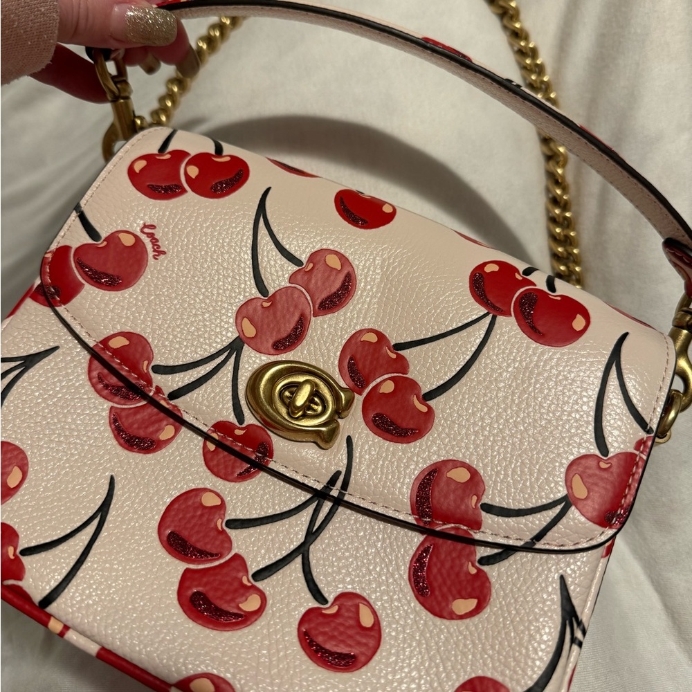 Coach Cassie in cherry print *New* with dust cover RARE